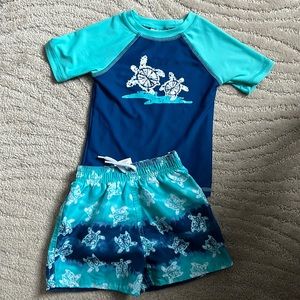 Baby Floatimini sea turtle swim set rash guard and bathing suit trunks